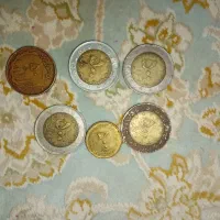 تعدادی سکه و اسکناس کلکسیونی