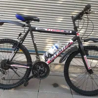 دوچرخه سایز۲۴دنده ای شیمانو تنه بلندصحیح وسالم