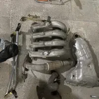 منیفولد دود و هوا بوستر ترمز دنا و ای اف سون