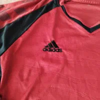 دو عدد لباس ورزشی