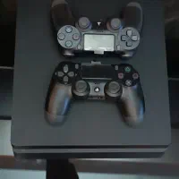 ps4 slim 1t با ۱۵ بازی معاوضه هم دارم باموتور تمیز