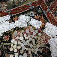 55 عدد سکه قدیمی و 81 عدد کوپن قدیمی