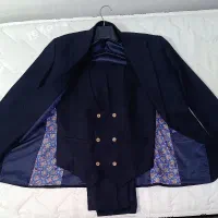 کت و شلوار همراه یک جلیقه زیر قیمت