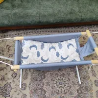 گهواره (ننو) در حد نو|اسباب و اثاث بچه|تهران, خاک سفید|دیوار