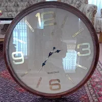 ساعت دیواری چوبی آکبند همراه با کارتن