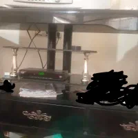 میز تلویزیون شیشه ای نشکن