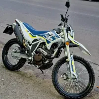 موتور تریل کویر T4 مدل 1401 در حد نو ، خشک و آکبند