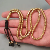 تسبیح فلز برنجی طلایی ۱۰۱دانه رنگ ثابت شش وجهی