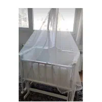 تخت و گهواره کنار مادر