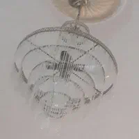 مبل پردهها و جفت لوستر ساعت میز تلوزیون و باندها