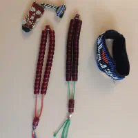 دو عدد تسبیح و بازو بندو جا فندک