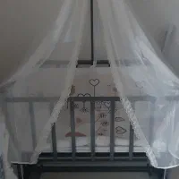 گهواره تخت کنار مادر