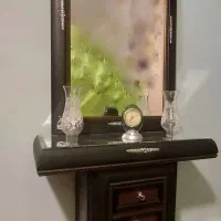 آینه کنسول همراه با ساعت و شمعدان