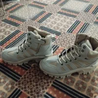 پوتین|کیف، کفش، کمربند|کنگاور, |دیوار