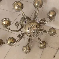 وسایل برنجی  لوستر. شمعدان. میز اتو.میز برش