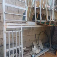 درب آهنی با پنجره و فرم آهنی