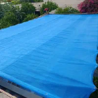 فروش نصب توری سبز آفتابگیر چمن مصنوعی تجهیزات باغی