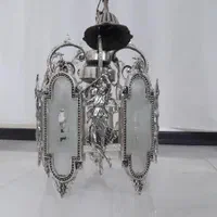 لوستر برنزی با طرح هخامنشی|لوستر و چراغ آویز|اصفهان, صدف|دیوار