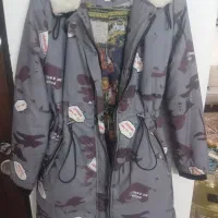 تعدادی پالتووکاپشن