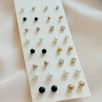 گوشواره میخی پک دار 16جفتی مروارید و نگینی چند رنگ