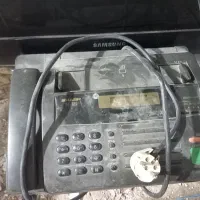 تلفن فکس شارپ تو انباری بوده گرد و خاک گرفته