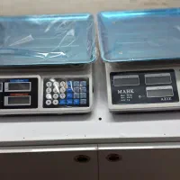 ترازو .باسکول . دستگاه پرس صنعتی و رومیزی