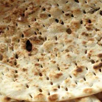 شاطر حرفه‌ای برای پخت نان گرد تافتون