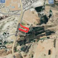 زمین دشتروم لب  جاده اصلی بابا میدان تنگاری