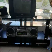 تلویزیون رادیو ضبط و میز تلویزیون شیشه ای