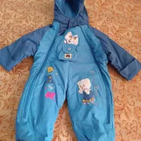 کاپشتن و سارافون و شلوار و روروک بچه