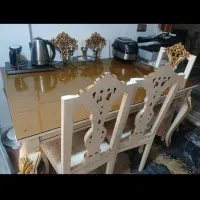 میز نهار خوری جنس چوب شیشه دودی شیک