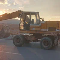 خاکبرداری بیل تخریب