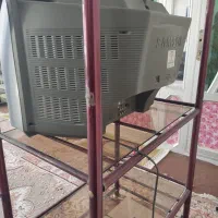 تلویزیون سامسونگ قدیمی و زیر تلویزیونی