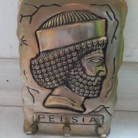 جالباسی تزیینی هخامنشی برنج