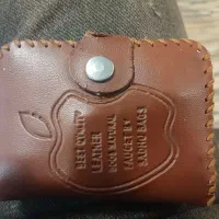 کیف پول و مدارک شامل  کارت ملی گواهینامه کارت