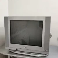 تلویزیون 21اینچ همراه میز و دستگاه دیجیتال