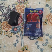 غذای ماهی دیسکس و شیشه پاکن