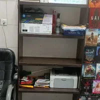 قفسه . کتابخانه .