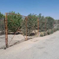 زمین فنس کشی شده بر اصلی باغ فردوس