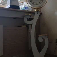 بوفه. ساعت ایستاده. آینه با شمعدونی ها