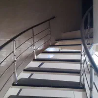 فروش پله پیچ فلزی با نرده استیل و کفی  mdf