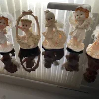 مجسمه و گلدان