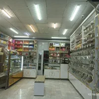 فروش کلیه لوازم و قفسه های آجیل و شیرینی