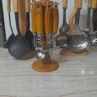 کفگیر ملاقه و ابزار آشپزخانه استیل وتفلون