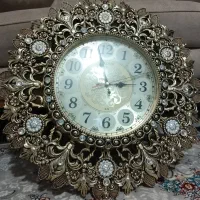 ساعت دیواری طرح برنجه