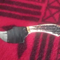 یک چاقوی خوش دست آب کاری شوده