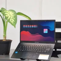 Asus x 1404 za