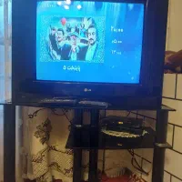 تلویزیون LG سی اینچ + دیجیتال + میز زیرتلویزیون