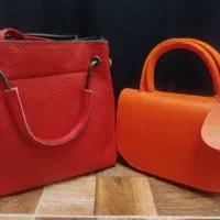 دو عدد کیف رنگ نارنجی و قرمز مایل به تعویض