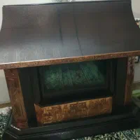 دو عدد بخاری دیواری و طرح شومینه تمیز